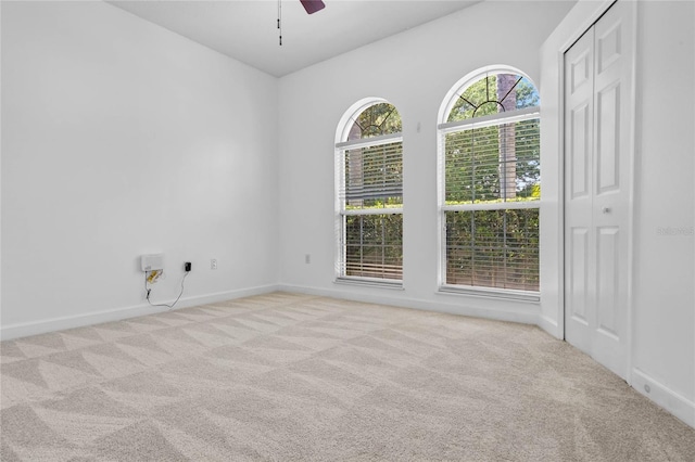 1803 Glenbay Ct, Windermere, FL 34786 - carpeted empty room featuring baseboards and ceiling fan