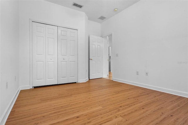 1803 Glenbay Ct, Windermere, FL 34786 - unfurnished bedroom with visible vents, light wood finished floors, and baseboards