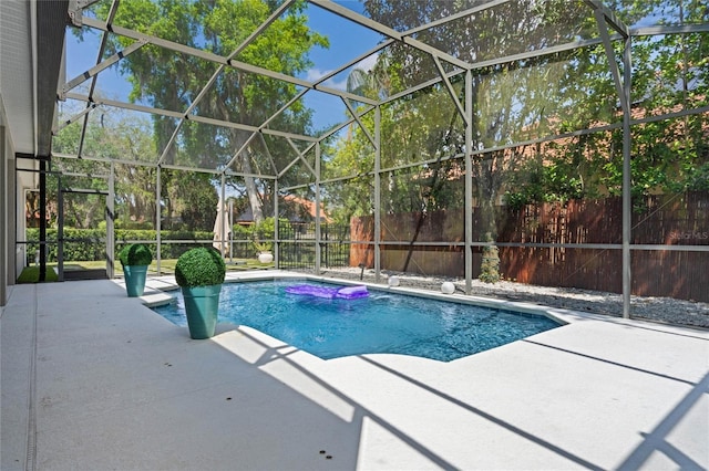 1803 Glenbay Ct, Windermere, FL 34786 - view of pool featuring glass enclosure, a patio, a fenced in pool, and a fenced backyard