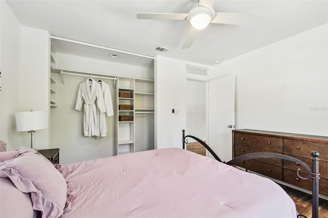 913 Tennessee Ln, Sarasota, FL 34234 - bedroom featuring wood finished floors, a closet, and a ceiling fan