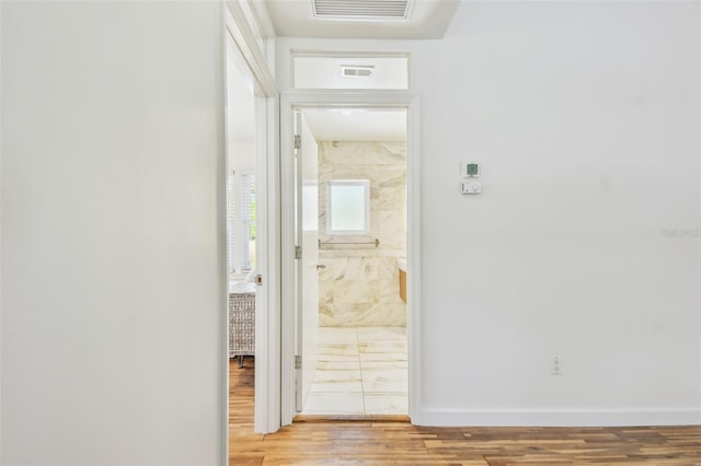 913 Tennessee Ln, Sarasota, FL 34234 - corridor featuring wood finished floors