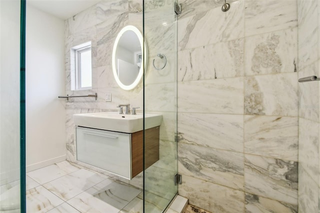 913 Tennessee Ln, Sarasota, FL 34234 - full bathroom featuring vanity, an enclosed shower, marble finish flooring, and baseboards
