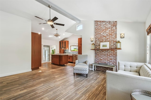 913 Tennessee Ln, Sarasota, FL 34234 - living area with wood finished floors, healthy amount of natural light, ceiling fan, and baseboards