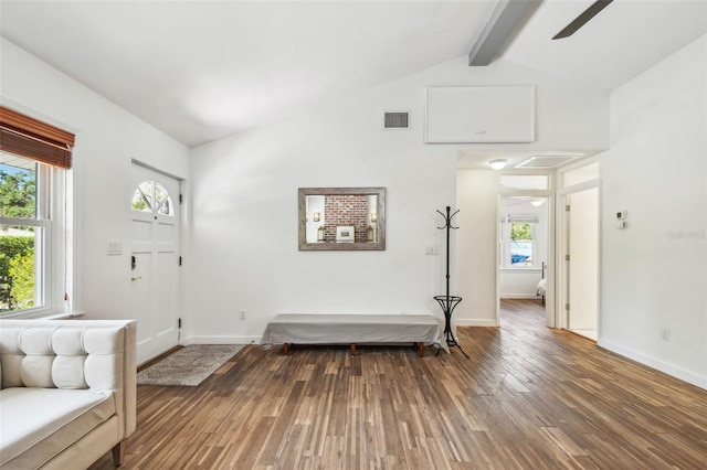 913 Tennessee Ln, Sarasota, FL 34234 - living room featuring hardwood / wood-style flooring, beamed ceiling, baseboards, and high vaulted ceiling