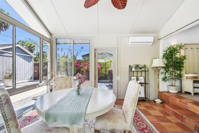 913 Tennessee Ln, Sarasota, FL 34234 - dining space with a wall mounted air conditioner and vaulted ceiling