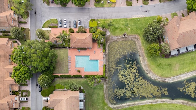 birds eye view of property with a residential view