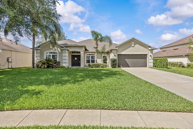 235 Largovista Dr, Oakland, FL 34787 - ranch-style home featuring an attached garage, driveway, stucco siding, and a front lawn