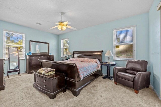 235 Largovista Dr, Oakland, FL 34787 - bedroom featuring carpet floors, baseboards, and multiple windows