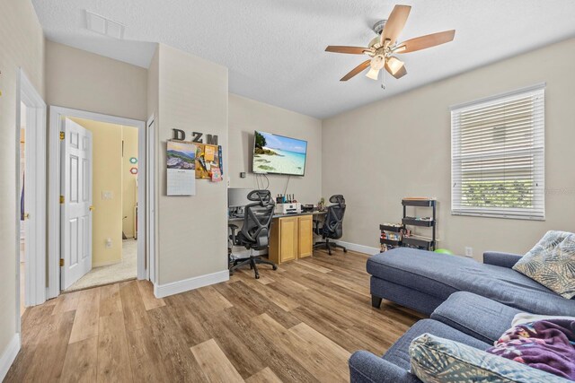 235 Largovista Dr, Oakland, FL 34787 - office featuring visible vents, light wood-style flooring, a ceiling fan, and baseboards