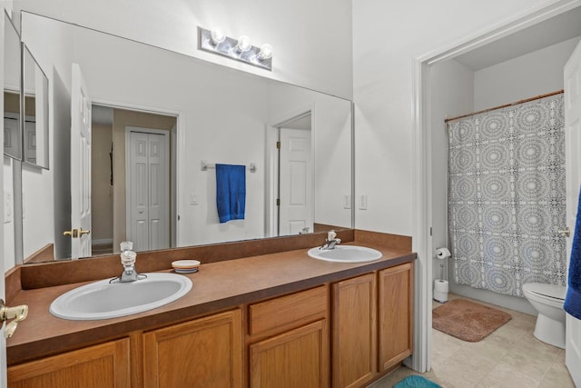 235 Largovista Dr, Oakland, FL 34787 - full bathroom with toilet, curtained shower, double vanity, and a sink