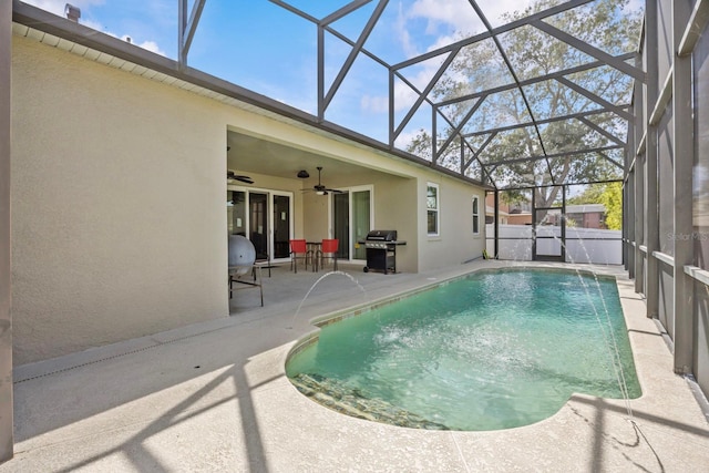 235 Largovista Dr, Oakland, FL 34787 - view of swimming pool featuring a ceiling fan, grilling area, glass enclosure, a patio, and a fenced in pool