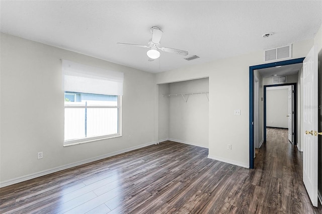 37 Lindsay Dr, Palm Coast, FL 32137 - unfurnished bedroom featuring visible vents, baseboards, a closet, and wood finished floors
