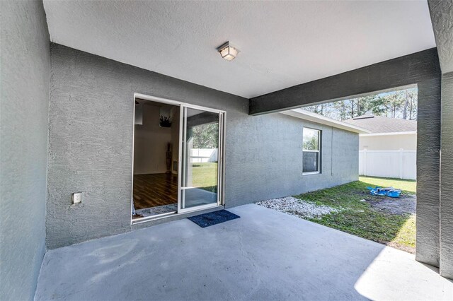 37 Lindsay Dr, Palm Coast, FL 32137 - view of patio / terrace with fence