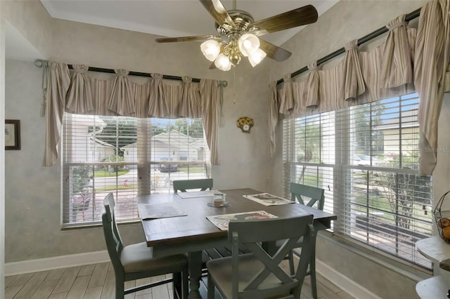 dining area with a wealth of natural light and baseboards