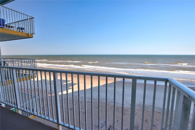 5203 S Atlantic Ave Unit 416B, New Smyrna Beach, FL 32169 - balcony featuring view of water and beach