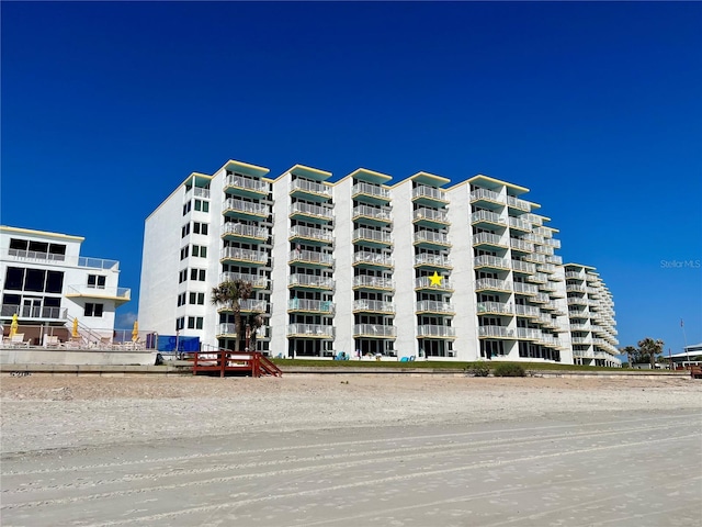5203 S Atlantic Ave Unit 416B, New Smyrna Beach, FL 32169 - view of apartment building / complex