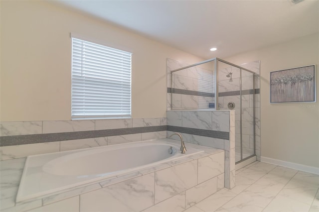 full bath featuring recessed lighting, a bath, marble finish floor, and a stall shower