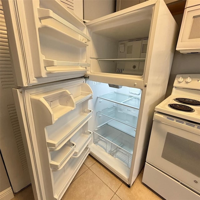 interior details with white appliances and white cabinets