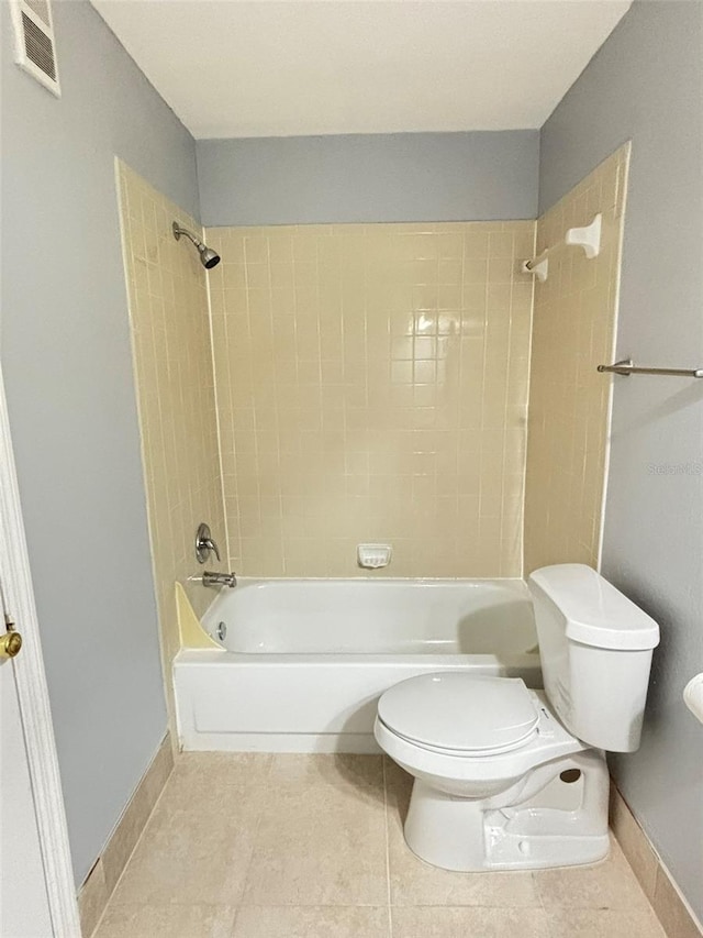 full bath with visible vents, toilet, tile patterned flooring, and baseboards