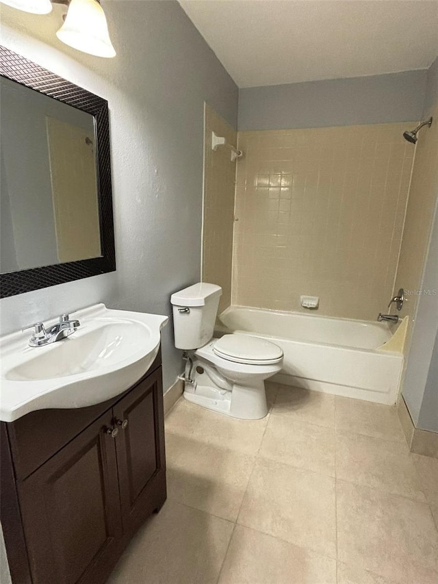 full bathroom with tub / shower combination, vanity, toilet, tile patterned floors, and baseboards
