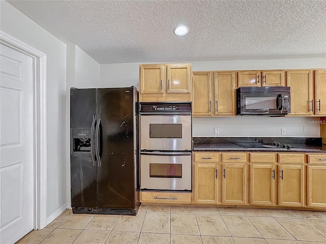 1176 Liberty Hall Dr, Kissimmee, FL 34746 - kitchen with black appliances, dark countertops, a textured ceiling, light tile patterned floors, and recessed lighting