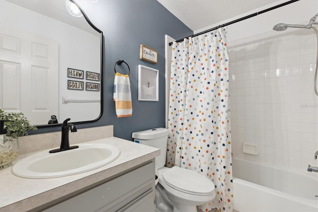 bathroom with shower / bath combination with curtain, toilet, and vanity