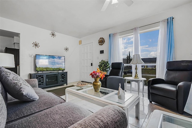 living room with a ceiling fan