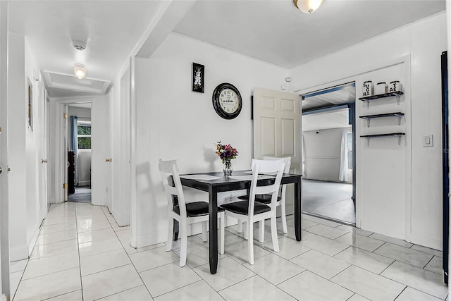 dining room featuring light tile patterned floors
