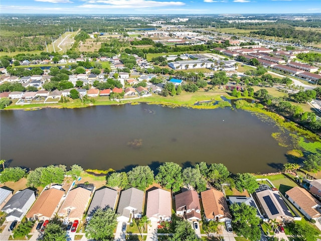 12511 Lake Vista Dr, Gibsonton, FL 33534 - bird's eye view with a water view and a residential view