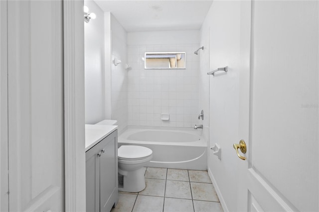 12511 Lake Vista Dr, Gibsonton, FL 33534 - full bathroom featuring tile patterned flooring, vanity, toilet, and tub / shower combination