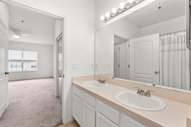 4897 Cypress Woods Dr Unit 6314, Orlando, FL 32811 - bathroom with a sink, a ceiling fan, and double vanity