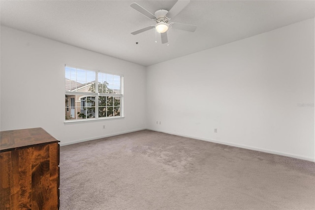 4897 Cypress Woods Dr Unit 6314, Orlando, FL 32811 - carpeted spare room featuring baseboards and a ceiling fan