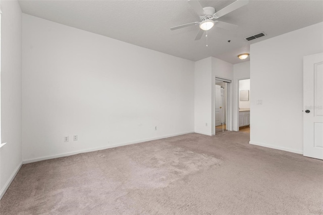 4897 Cypress Woods Dr Unit 6314, Orlando, FL 32811 - unfurnished bedroom with ensuite bath, visible vents, baseboards, and carpet