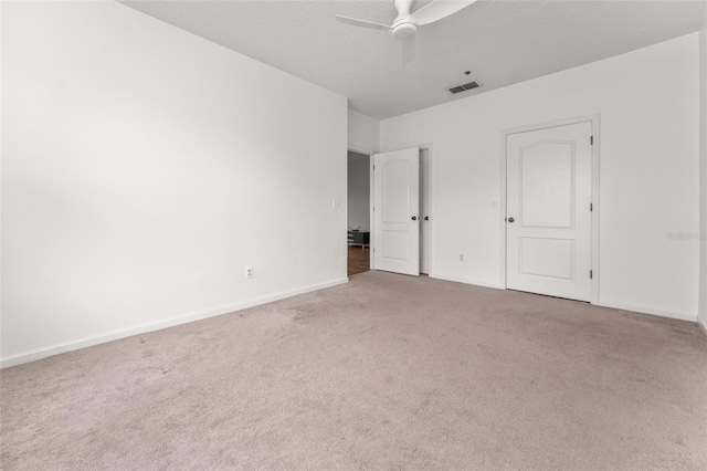 4897 Cypress Woods Dr Unit 6314, Orlando, FL 32811 - unfurnished bedroom featuring visible vents, baseboards, a ceiling fan, and carpet