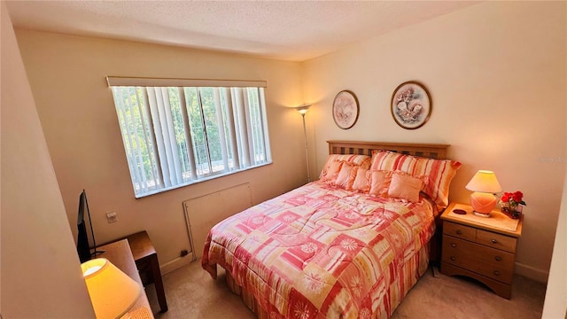 bedroom with light carpet