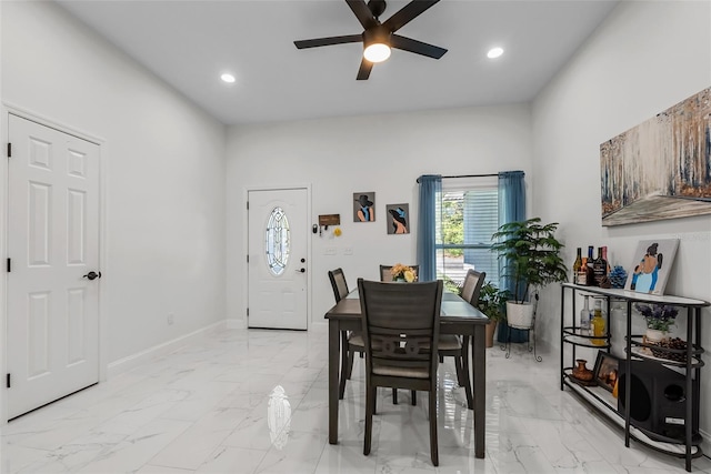 dining area featuring marble finish floor, ceiling fan, baseboards, and recessed lighting