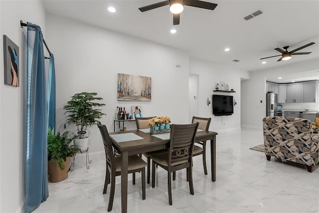 dining space featuring recessed lighting, visible vents, marble finish floor, and ceiling fan