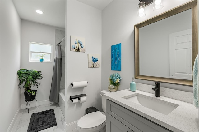 bathroom with vanity, toilet, marble finish floor, shower / tub combo with curtain, and baseboards
