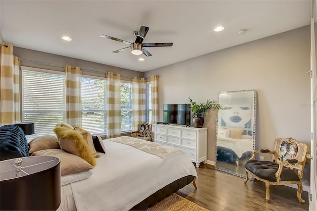 bedroom with ceiling fan, recessed lighting, and wood finished floors