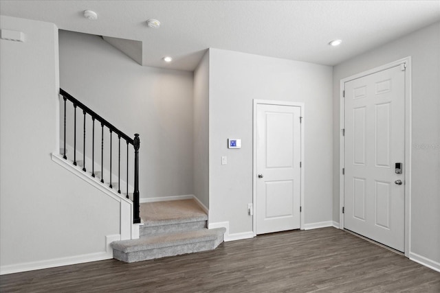 6165 Juneberry Way, Winter Garden, FL 34787 - foyer entrance featuring recessed lighting, stairs, dark wood-style floors, and baseboards