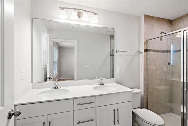 6165 Juneberry Way, Winter Garden, FL 34787 - full bathroom featuring a shower stall, double vanity, a sink, and visible vents