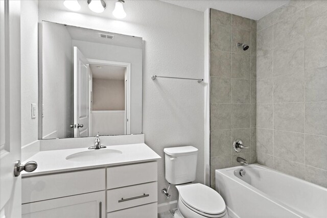 6165 Juneberry Way, Winter Garden, FL 34787 - bathroom featuring visible vents, toilet, vanity, and  shower combination