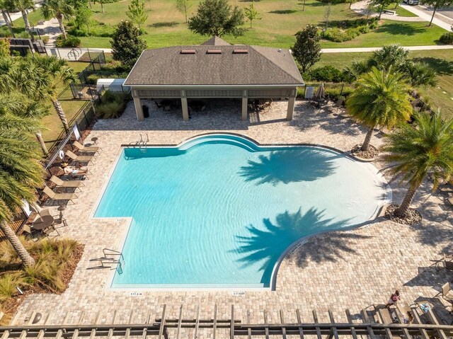 6165 Juneberry Way, Winter Garden, FL 34787 - pool featuring a patio area and fence