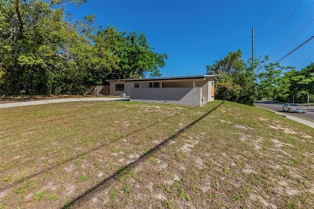 exterior space with a front yard