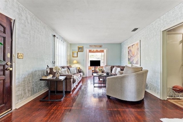 1204 N Shore Dr, Jacksonville, FL 32208 - living area featuring wood-type flooring, baseboards, visible vents, and wallpapered walls