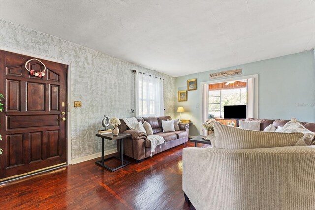 1204 N Shore Dr, Jacksonville, FL 32208 - living room featuring baseboards and wood finished floors