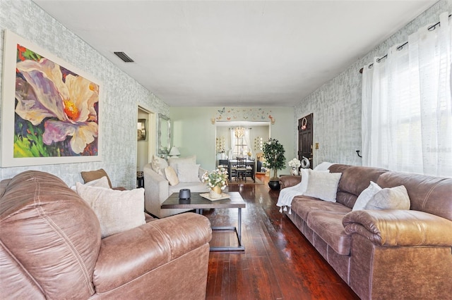 1204 N Shore Dr, Jacksonville, FL 32208 - living area featuring visible vents, wood-type flooring, and wallpapered walls