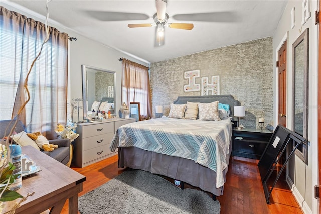 1204 N Shore Dr, Jacksonville, FL 32208 - bedroom with a ceiling fan and wood finished floors