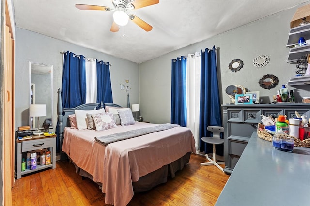 1204 N Shore Dr, Jacksonville, FL 32208 - bedroom with ceiling fan and wood-type flooring