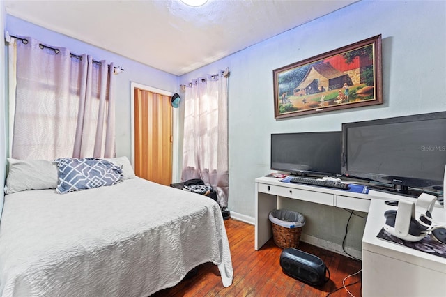 1204 N Shore Dr, Jacksonville, FL 32208 - bedroom with baseboards and hardwood / wood-style floors
